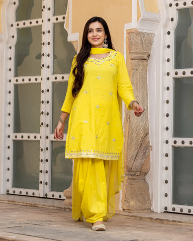 Trendy yellow embroidered suit set showcasing charming embellishments