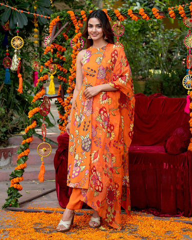 Vibrant orange suit set with delicate floral strokes for a stylish look