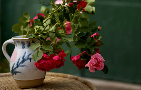 Hand painted floral jug.