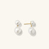 Bold Pearl Drop Earrings: Handcrafted in 18k gold vermeil with freshwater pearls, designed to be worn solo or stacked for a modern look.