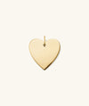 Gold heart-shaped Flat Heart Charm, perfect for adding a romantic touch to any jewelry stack.