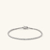 Lab Grown Diamond Tennis Bracelet 1.8mm: a close-up of a silver bracelet with small lab-grown diamonds, showcasing its intricate design and secure clasp mechanism.