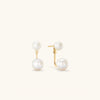 Bold Pearl Ear Jacket Studs featuring removable posts with freshwater pearls, handcrafted in gold vermeil, designed to wrap around the lobes for versatile styling.