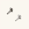 Diamond Curve Bar Flat Back Stud, implant grade titanium, close-up of two metal studs showcasing comfortable, threadless design for safe piercings.