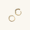 Easy Huggie Hoops: Handcrafted 14k gold hoop earrings with a clicker closure for comfort and security. Perfect for daily wear.