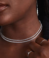 Woman wearing the Lab Grown Diamond Tennis Necklace 2.5mm, showcasing its 14k solid gold chain and sparkling lab-grown diamonds.