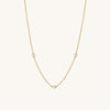 Satellite Necklace: A vermeil gold chain adorned with white sapphires, perfect for both casual and formal outfits.