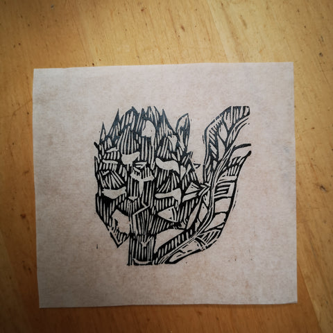 Wood engraved artichoke