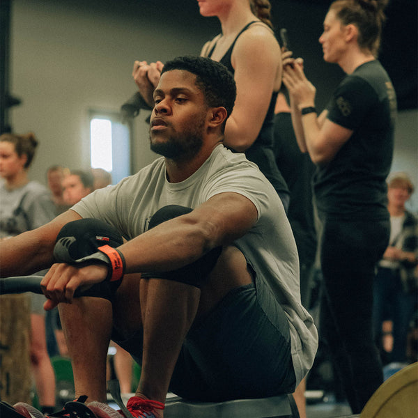 man using rowing machine