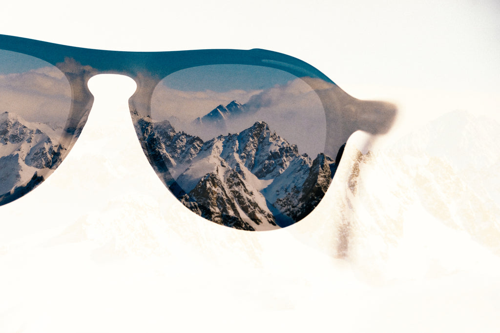 sunglasses with mountains in the lens