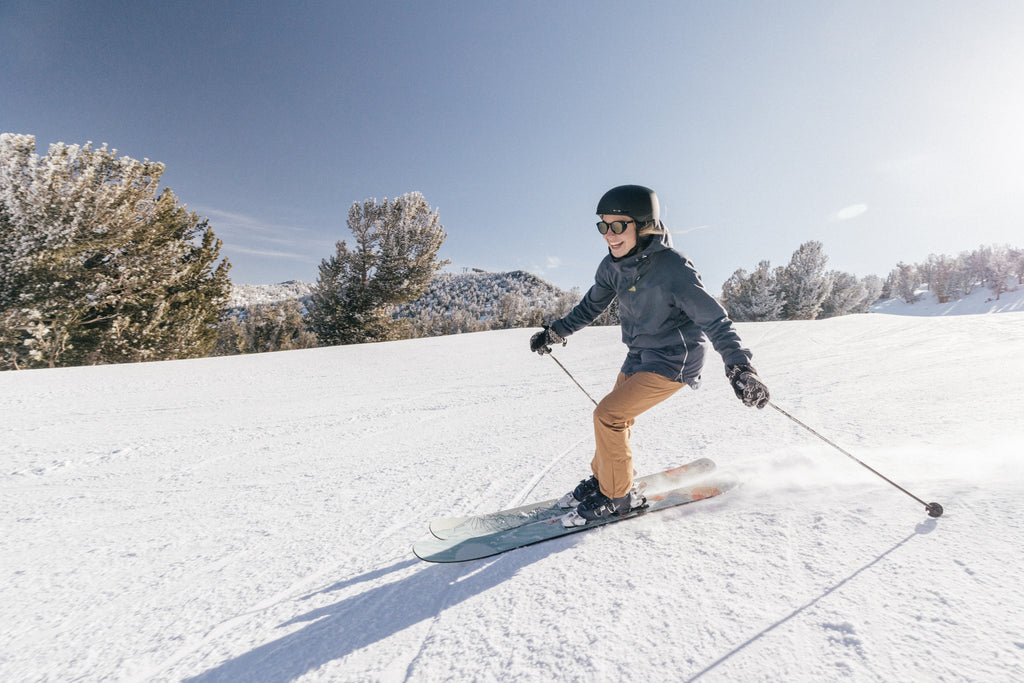 Skiing down the slopes on a sunny day