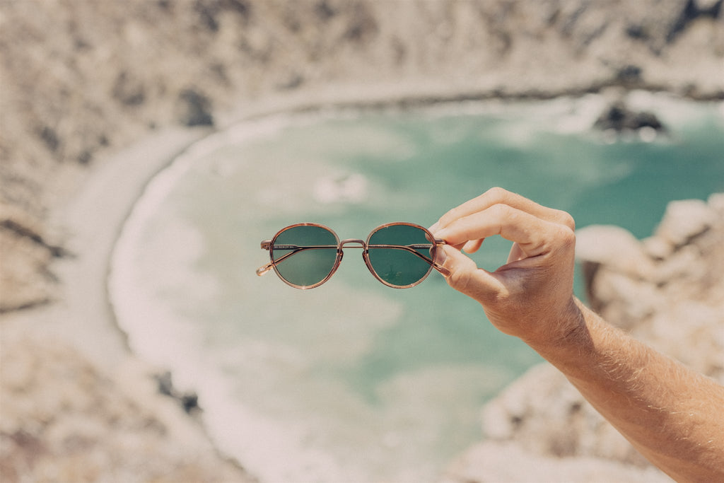sunglasses over a stunning beach