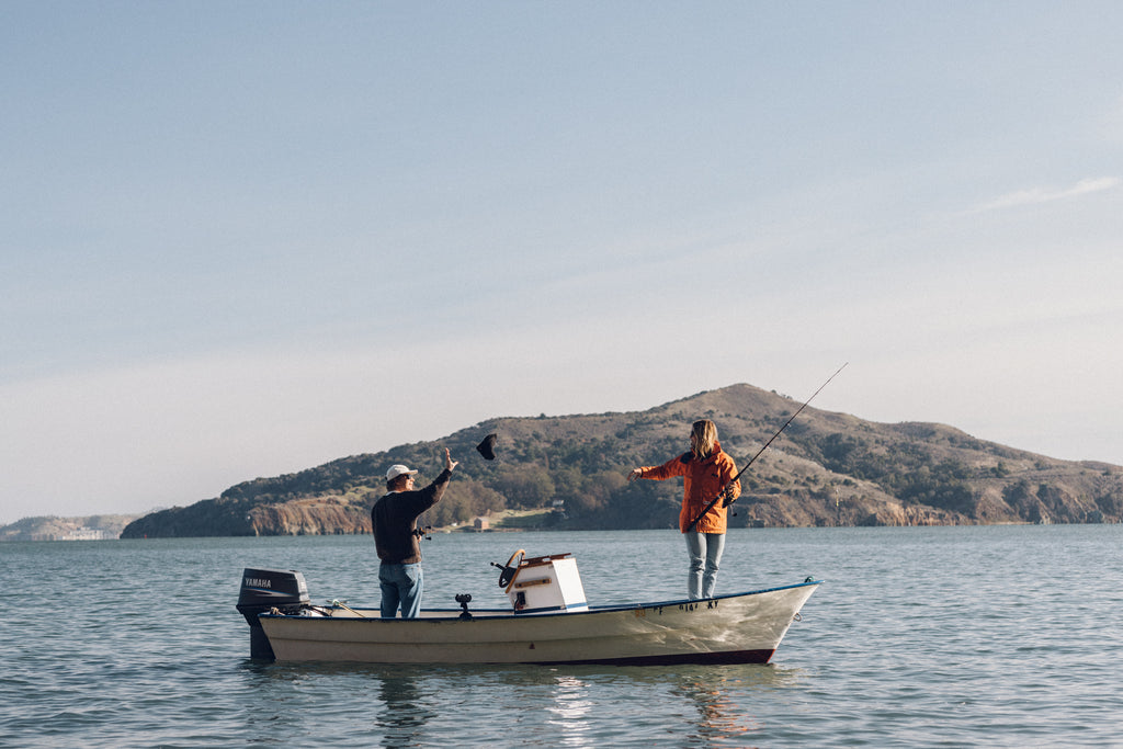 Two people out on the water fishing