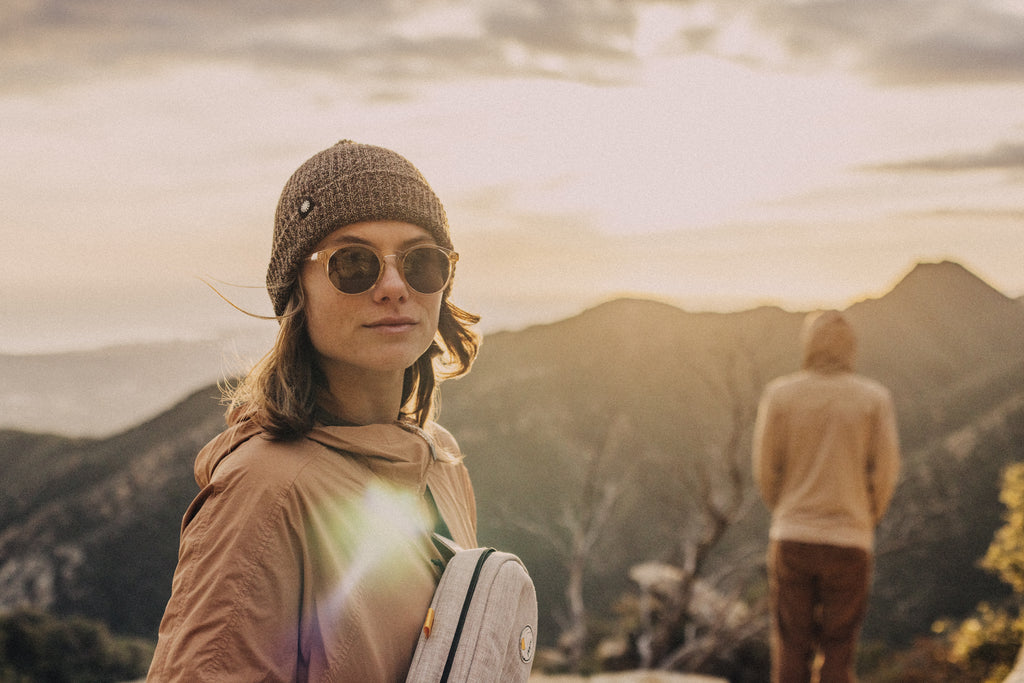 Group on a mountain peak at twilight