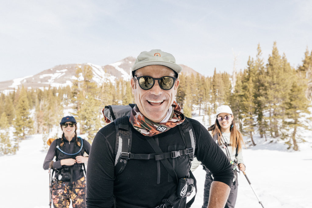 Group smiling while cross country skiing