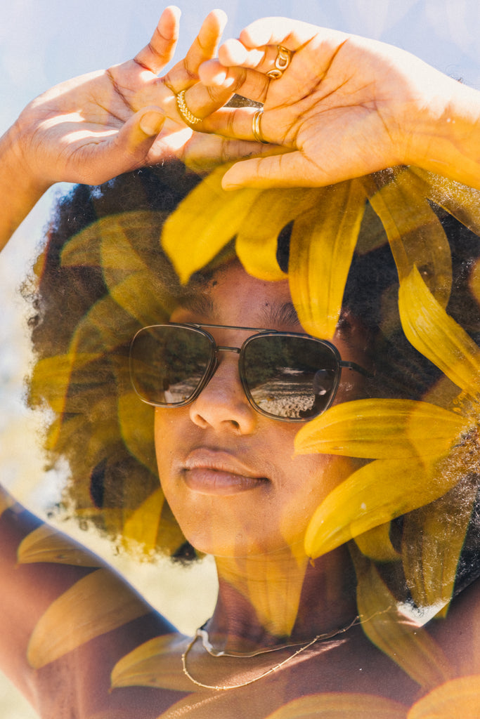 flowers overlaying girl wearing sunski estero sunglasses