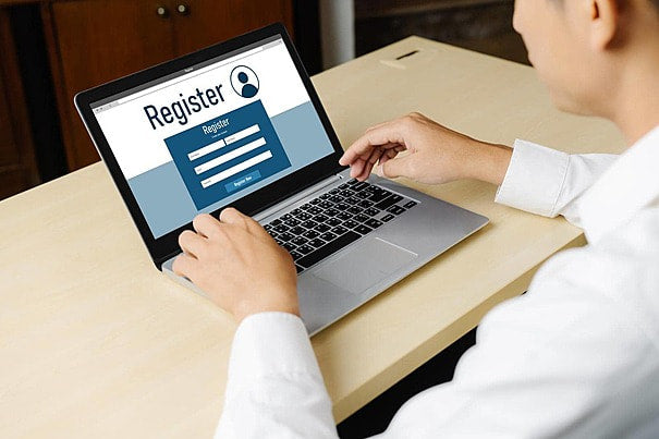 pngtree-online-registration-form-for-modish-form-filling-computer-registration-man-photo-image_47455892