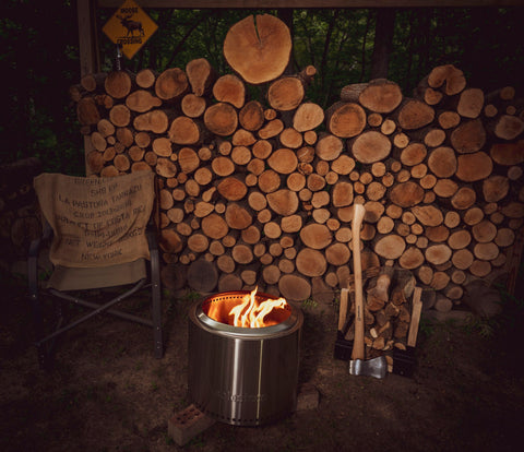 Solo Stove Bonfire with Fire wood background