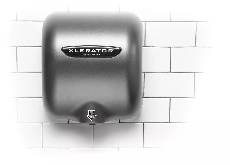 Xlerator Stainless Steel hand dryer mounted on white tiles