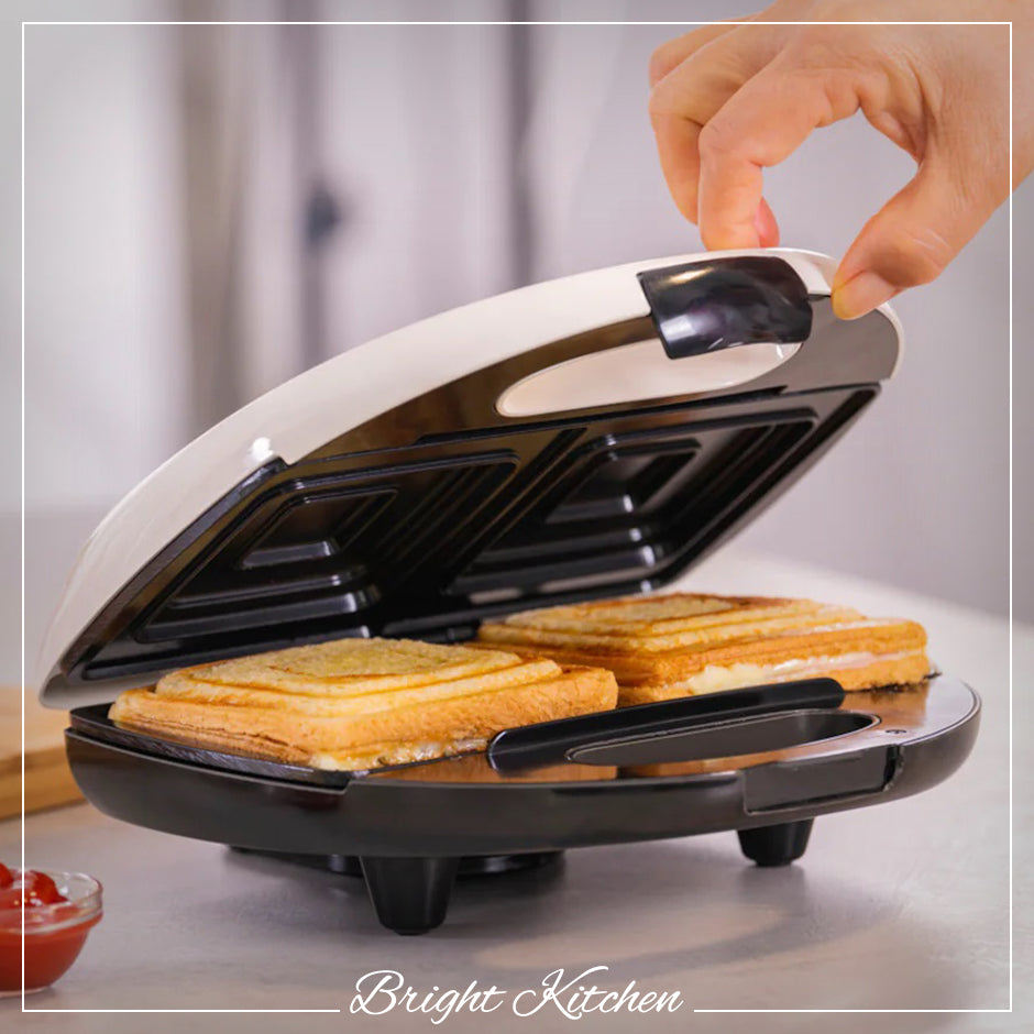 https://cdn.shopify.com/s/files/1/0799/4927/files/press-grill-sandwich-maker_2048x2048.jpg?v=1675350210