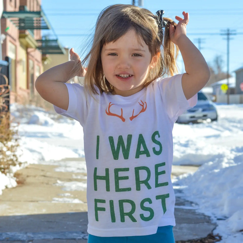 Addie in her big sister t-shirt