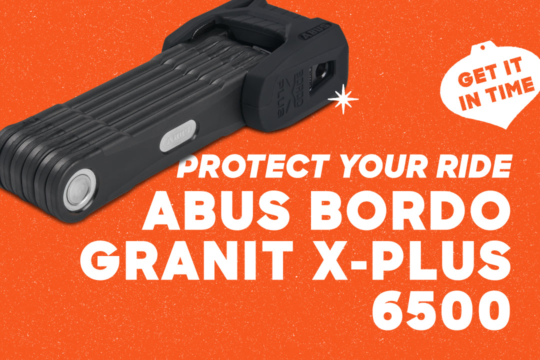 An ABUS Bordo Granit X-Plus 6500 on an orange backdrop. The text overlay reads "Protect Your Ride" and "Get it in time."