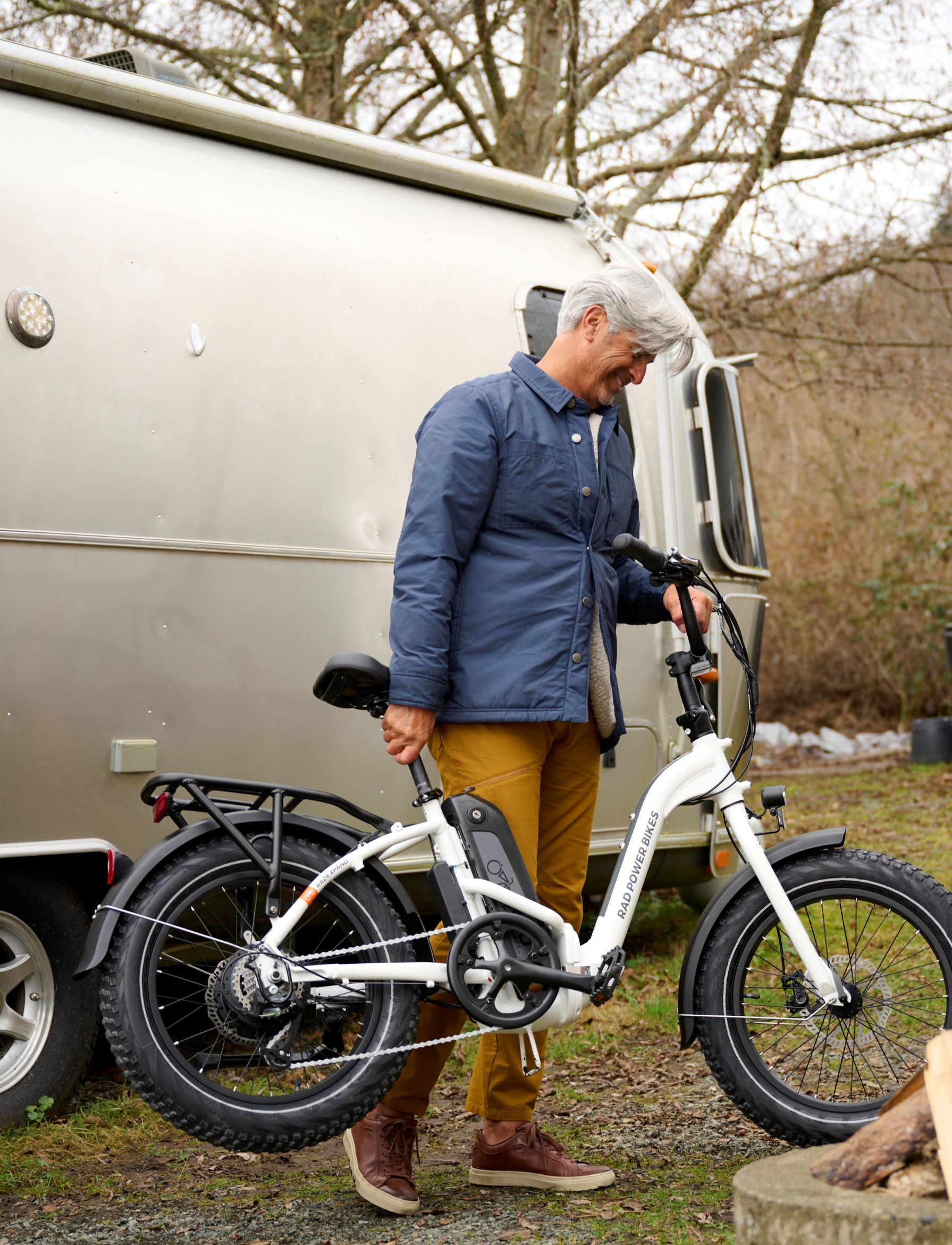 Man picks up ebike with ease.