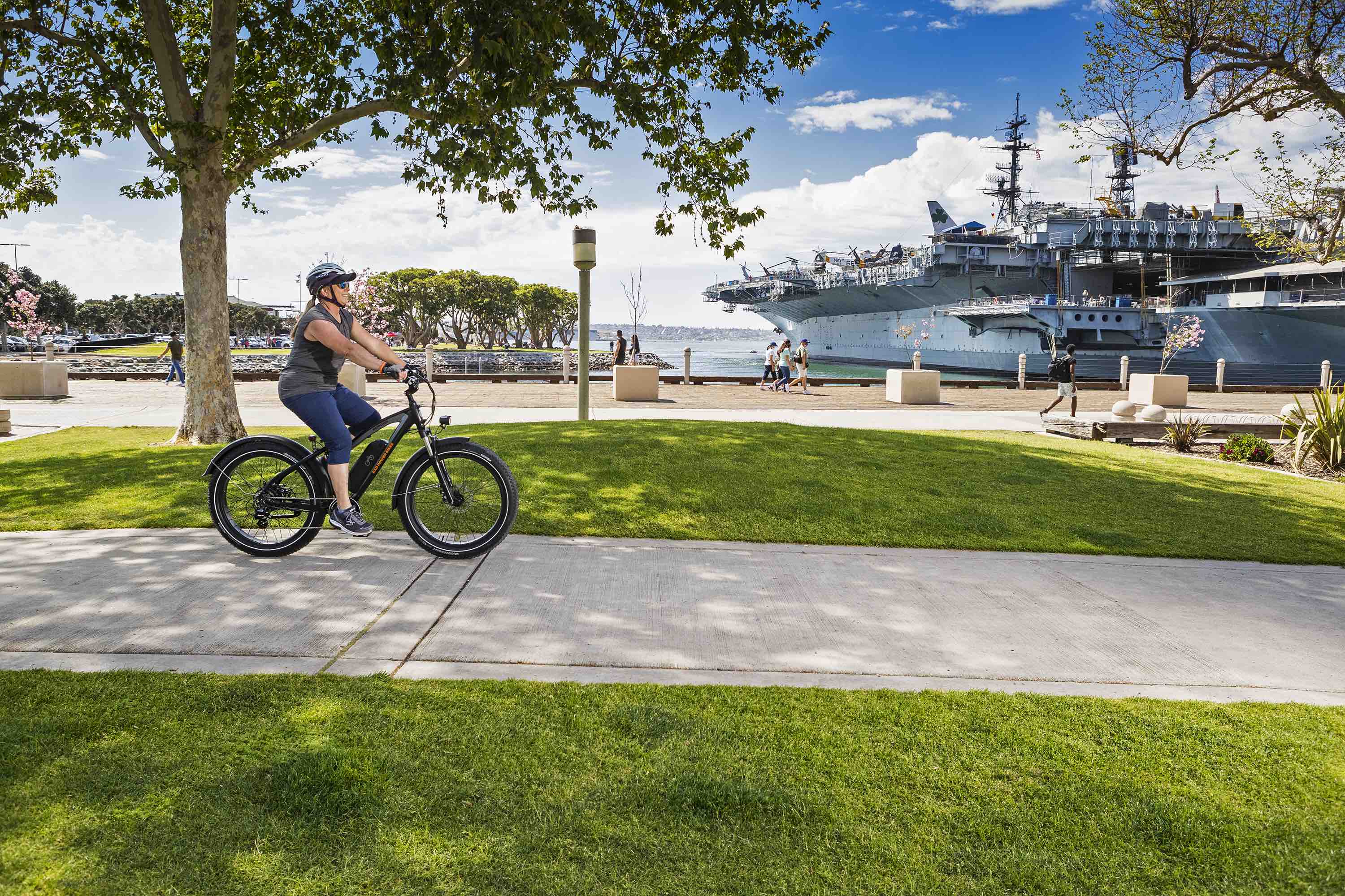 A woman rides an electric bike in San Diego.