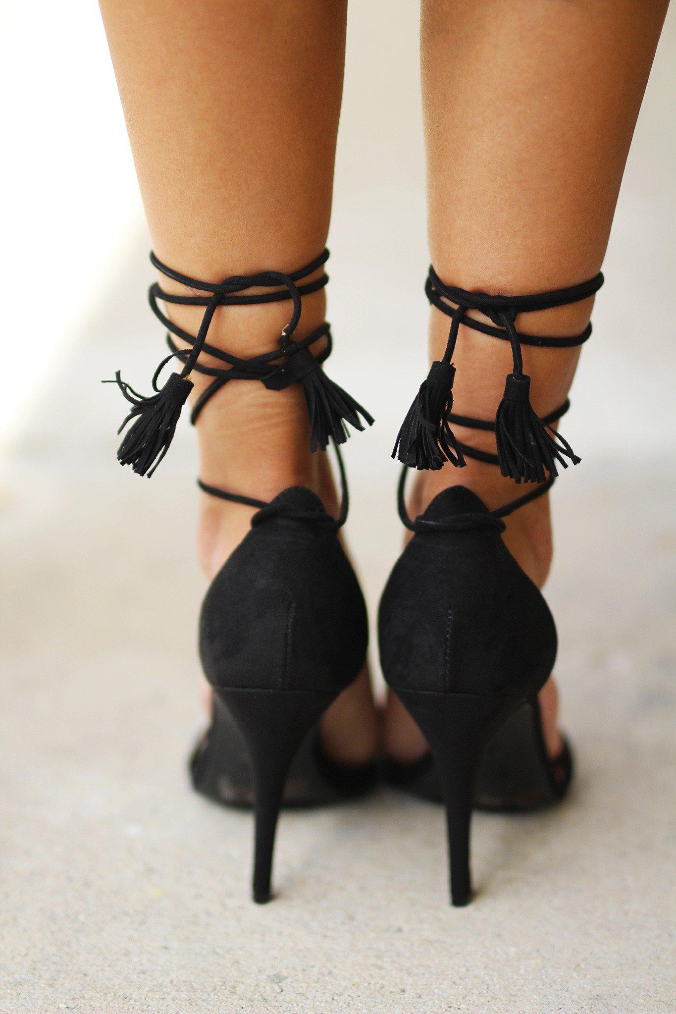 black tassel heels