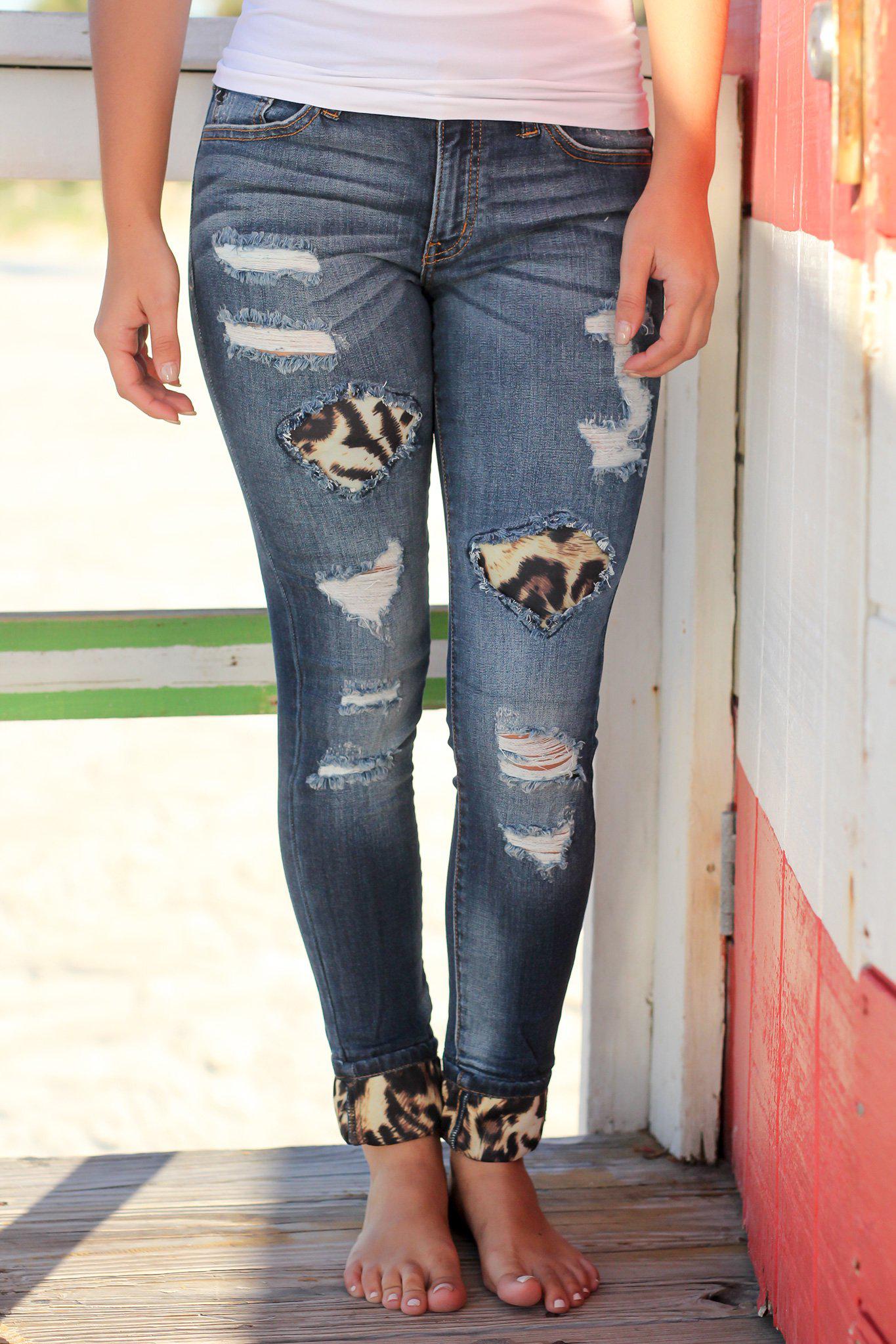 jeans with holes and patches