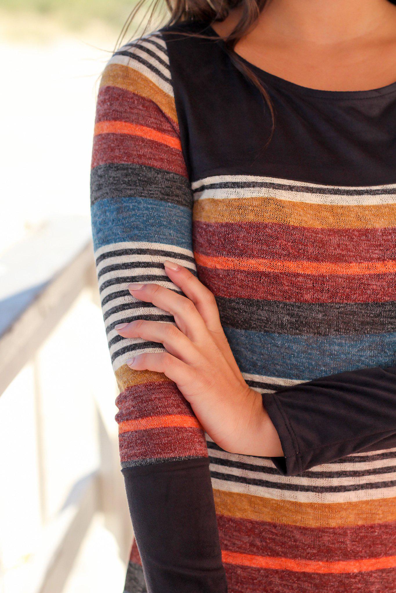 black dress with multicolored spots