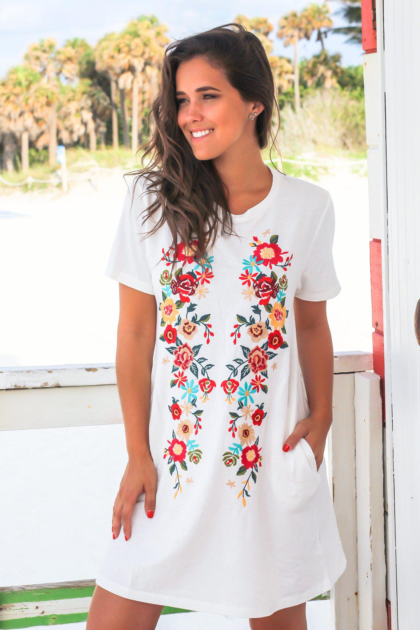 white dress with colorful embroidery