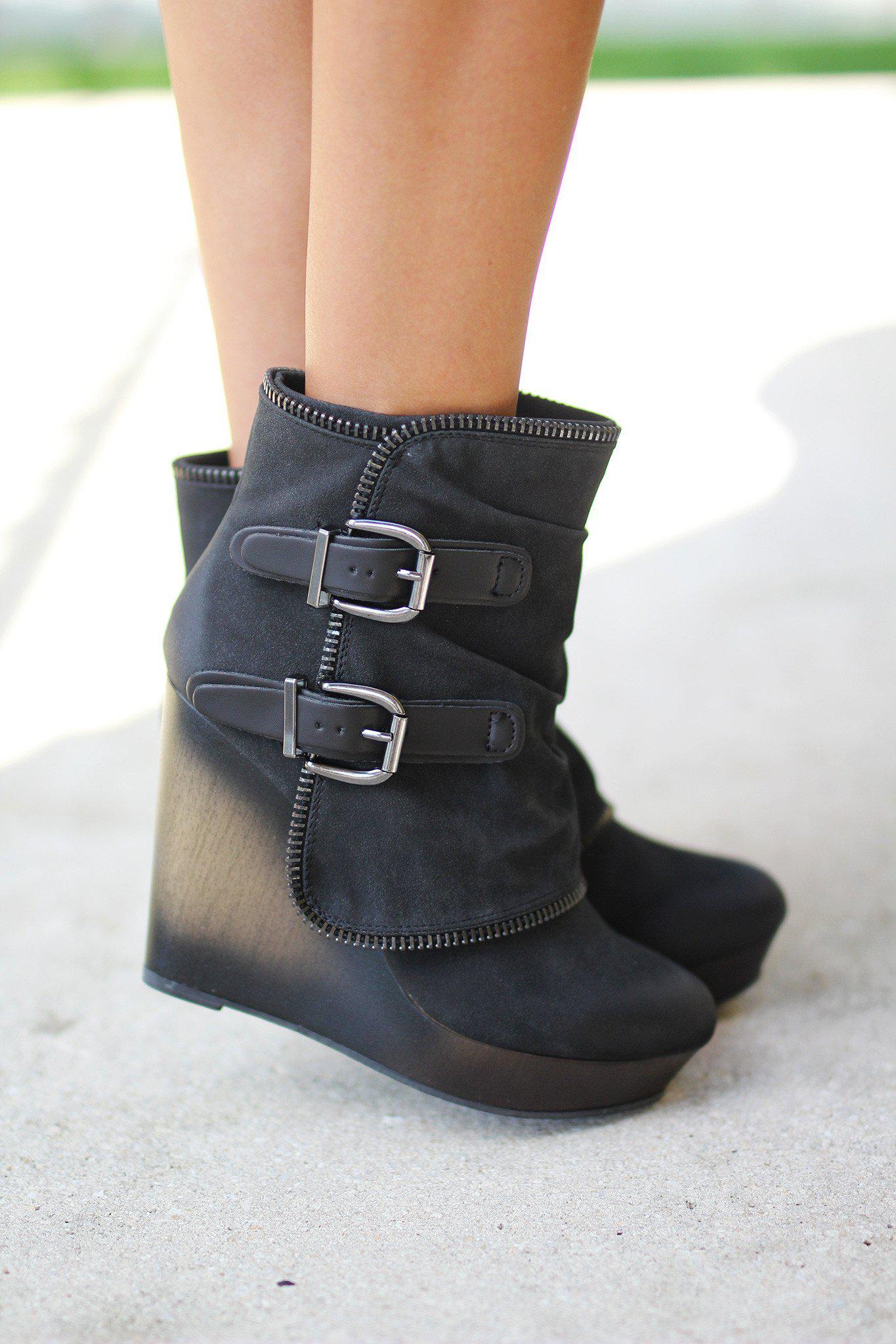 buckle wedge boots