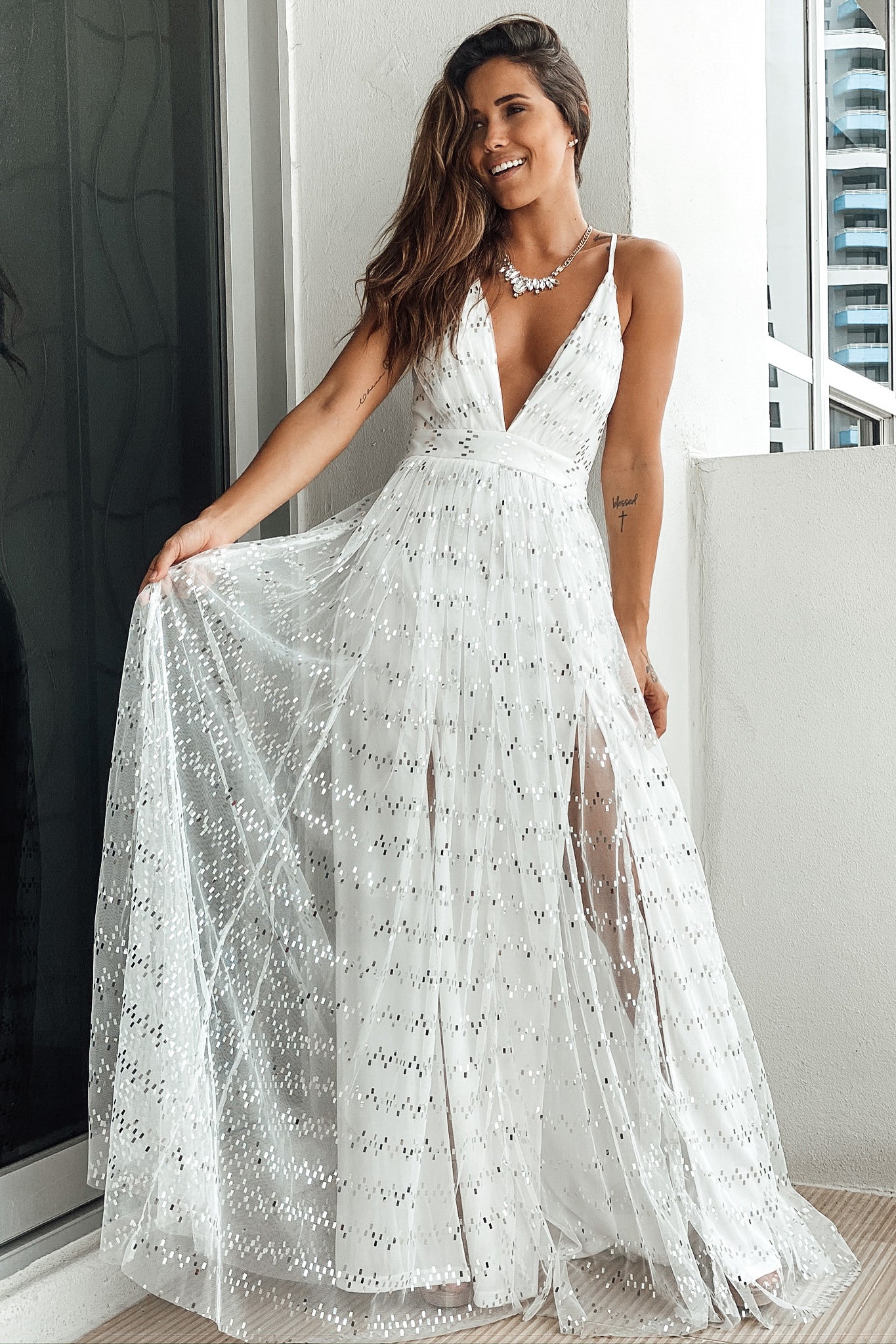 white and silver gown