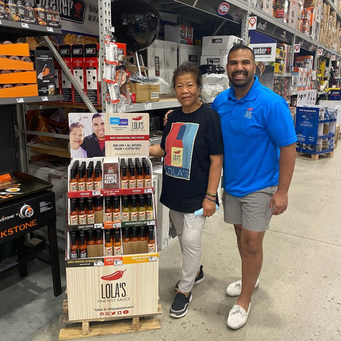 taufeek and mother in Lowe's with hot sauce