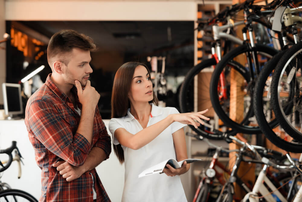 couples choosing what bike to buy