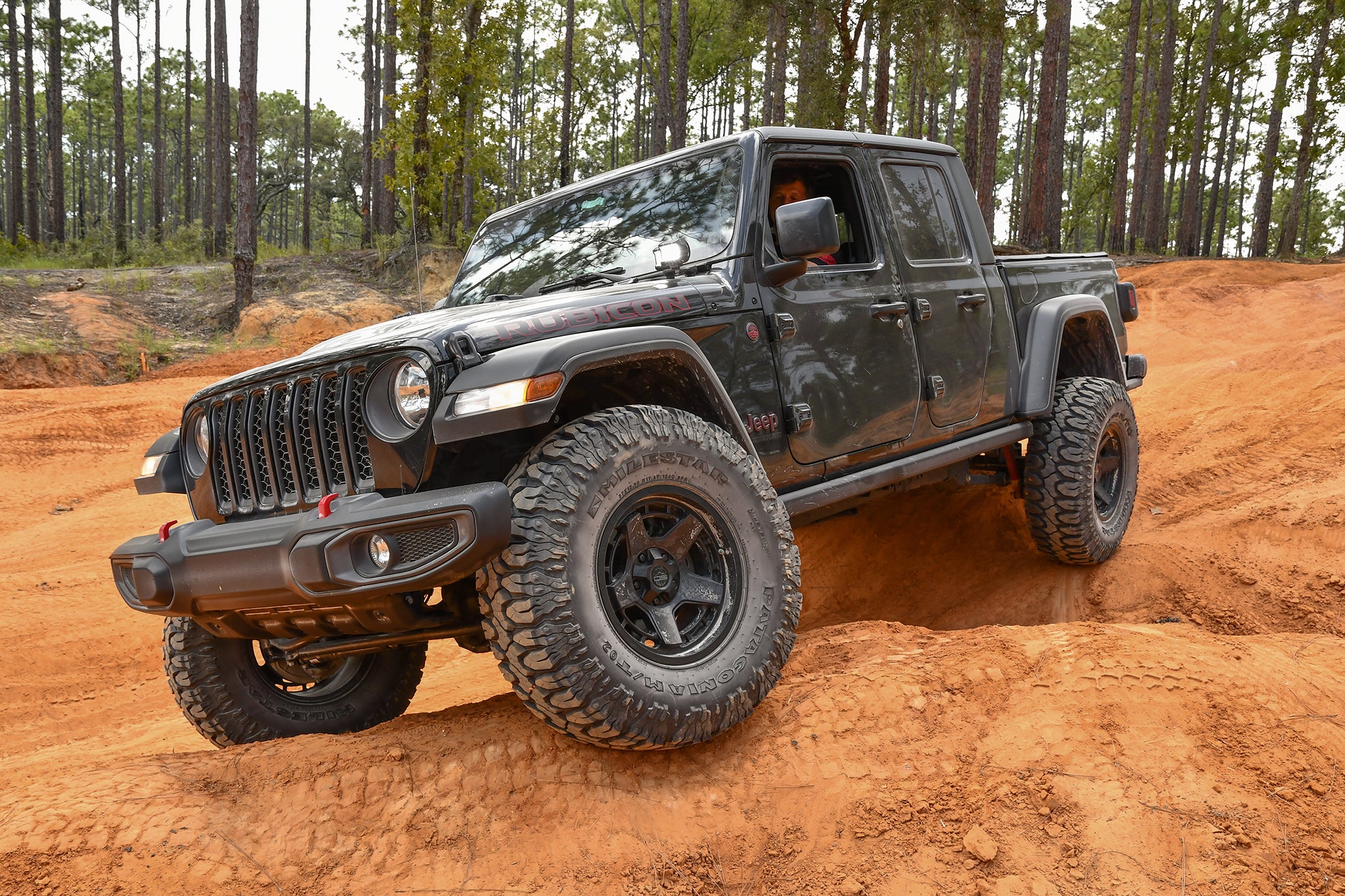 overland sector wheels jeep gladiator rubicon on 17x9 satin black atlas wheels in woods clay red dirt trail