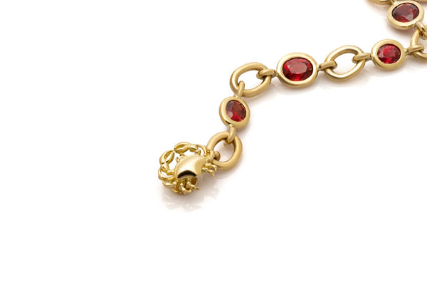 Red spinel bracelet. Bespoke bracelet. Red gemstone jewellery. Red gemstone bracelet. Serena Ansell fine jewellery. Crab jewellery. London jeweller.