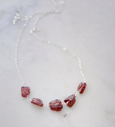 Rough Raw Red Garnet Necklace in Sterling Silver. Features five stones.