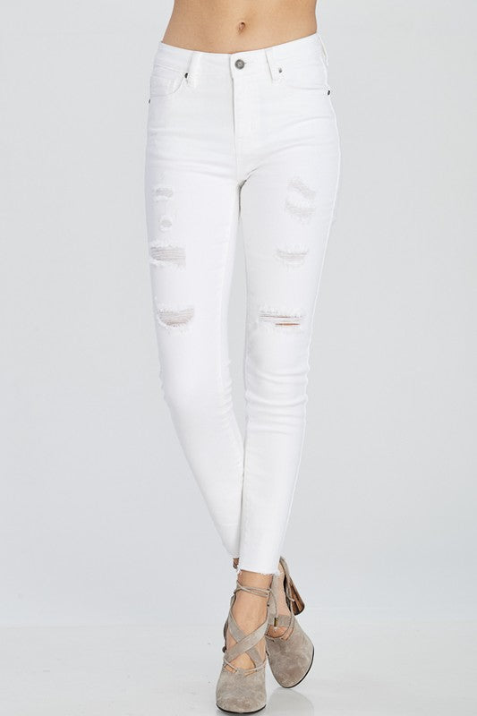 white skinny jeans with holes