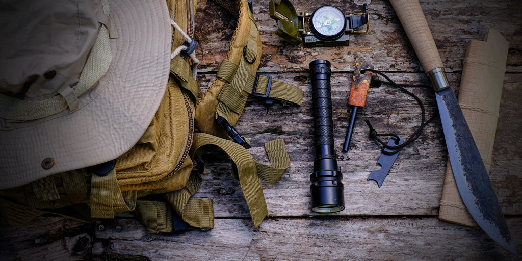 image of an assortment of woutdoors equipment suitable for an expert in bushcraft