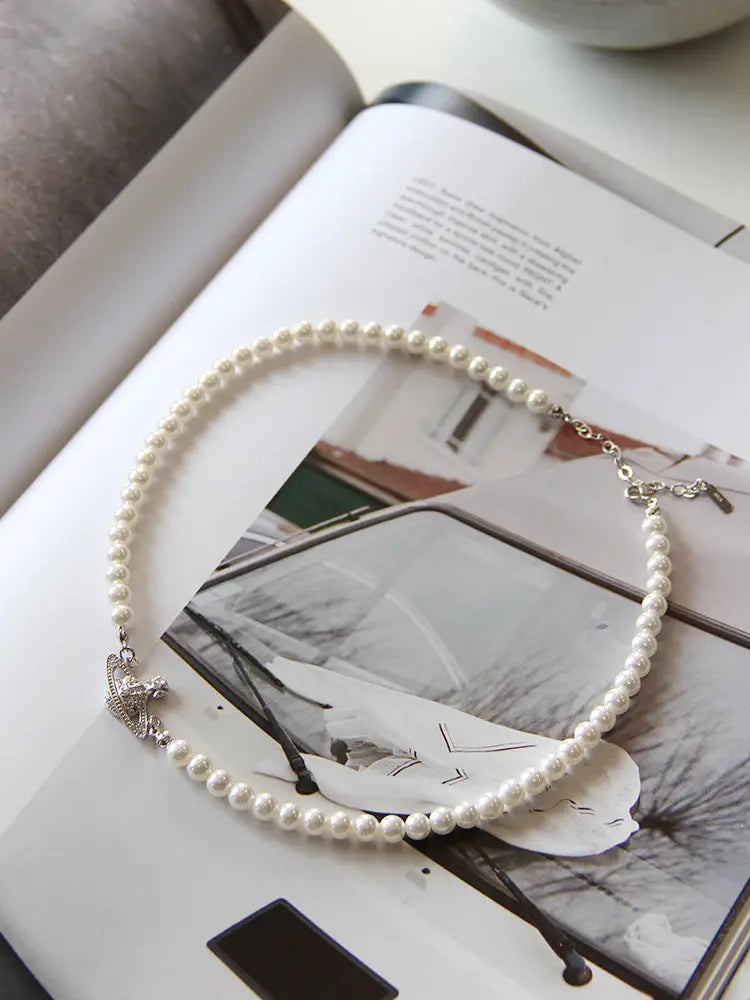 Saturn Pearl Necklace