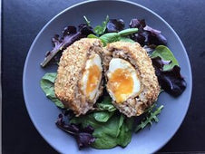 A CRIMPiT snack with egg filling served with salad