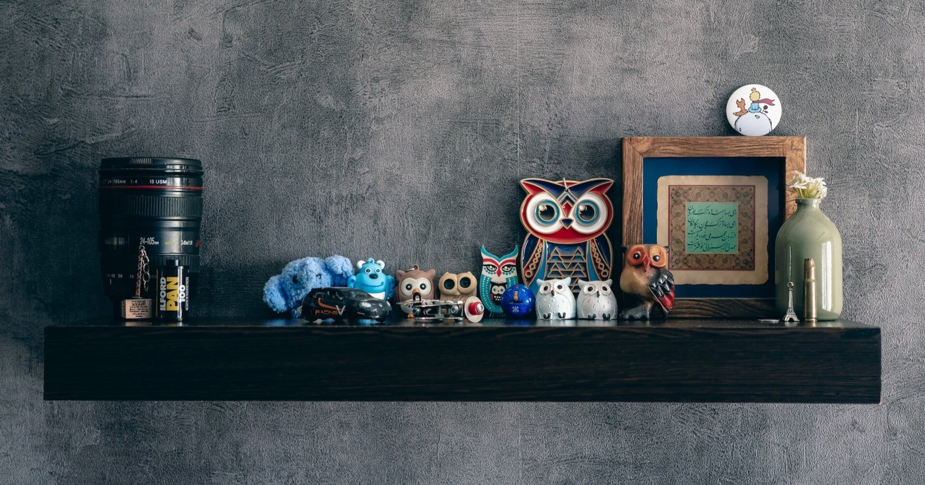 A captivating display of owl themed decor including small figurine