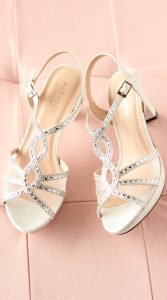 lottie-silver-occasion-shoes-on-bed