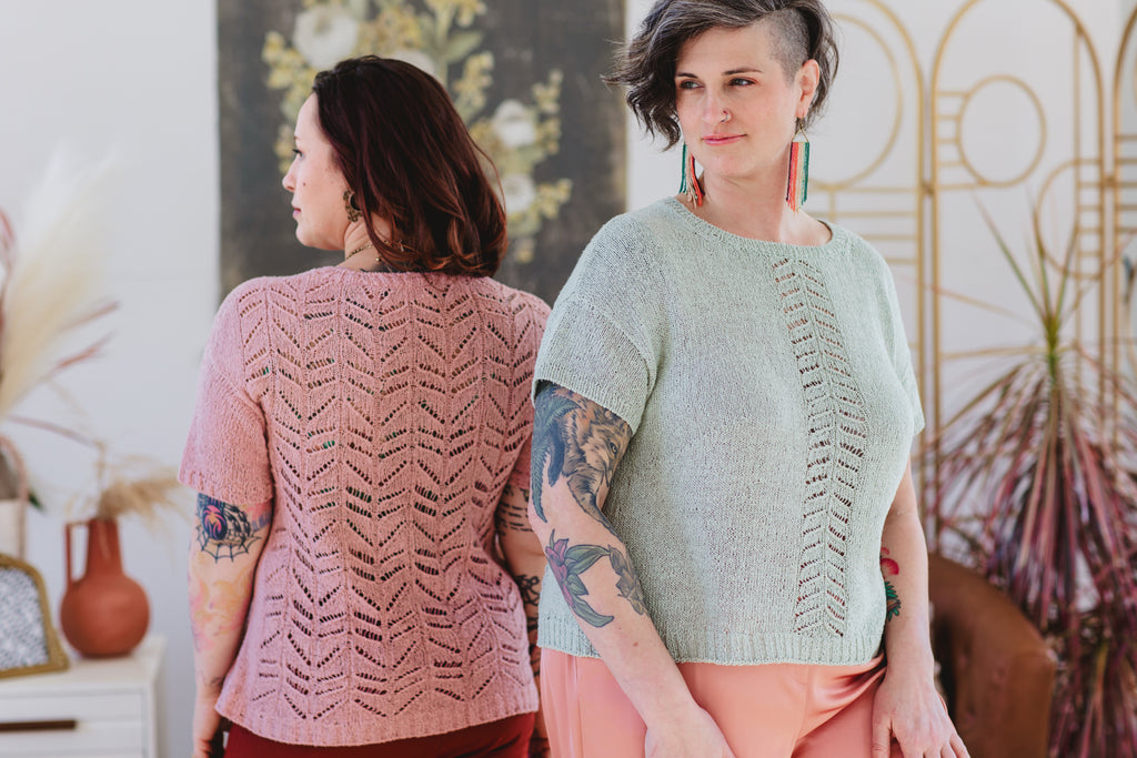 Bess and Jen are both wearing a rustic silk lace tee, hand knit with rhythmic lace panels in front and back.