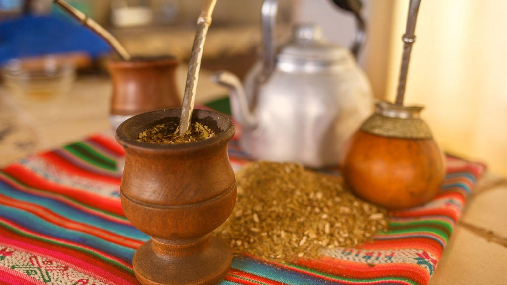 Traditional South American yerba mate tea glasses and table setup