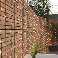 Fairylights on a wall lighting outdoors