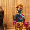 Painted Iron Krishna Figurine
