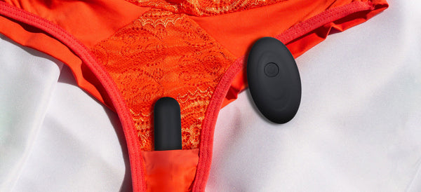 Bloom Bullet Vibrator And Remote Control Product Image Top View - Pictured On Red Panties